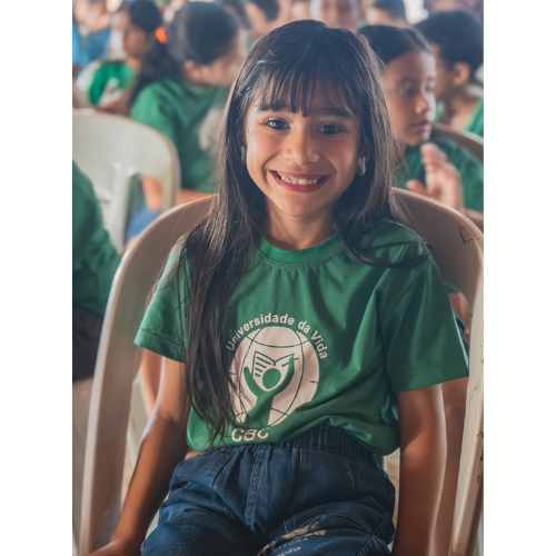 Child with logo on shirt