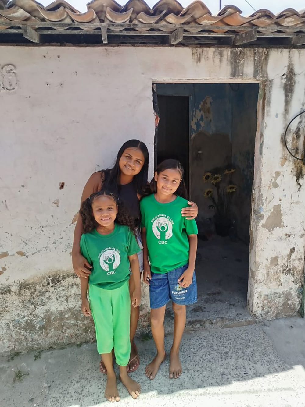 Family outside their home in the slums