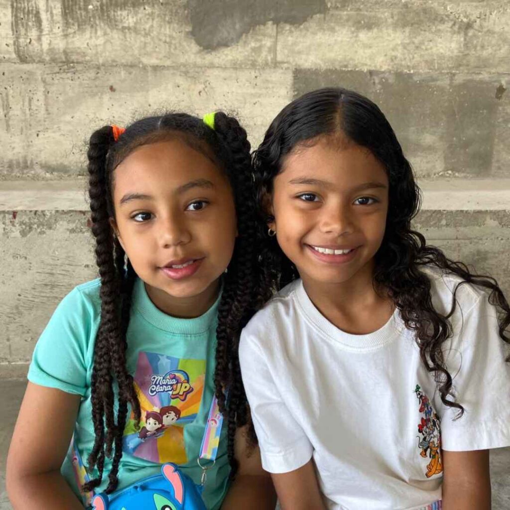 two girls at CBC smiling