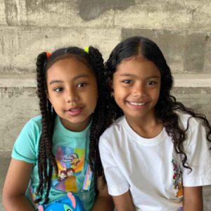 two girls at CBC smiling