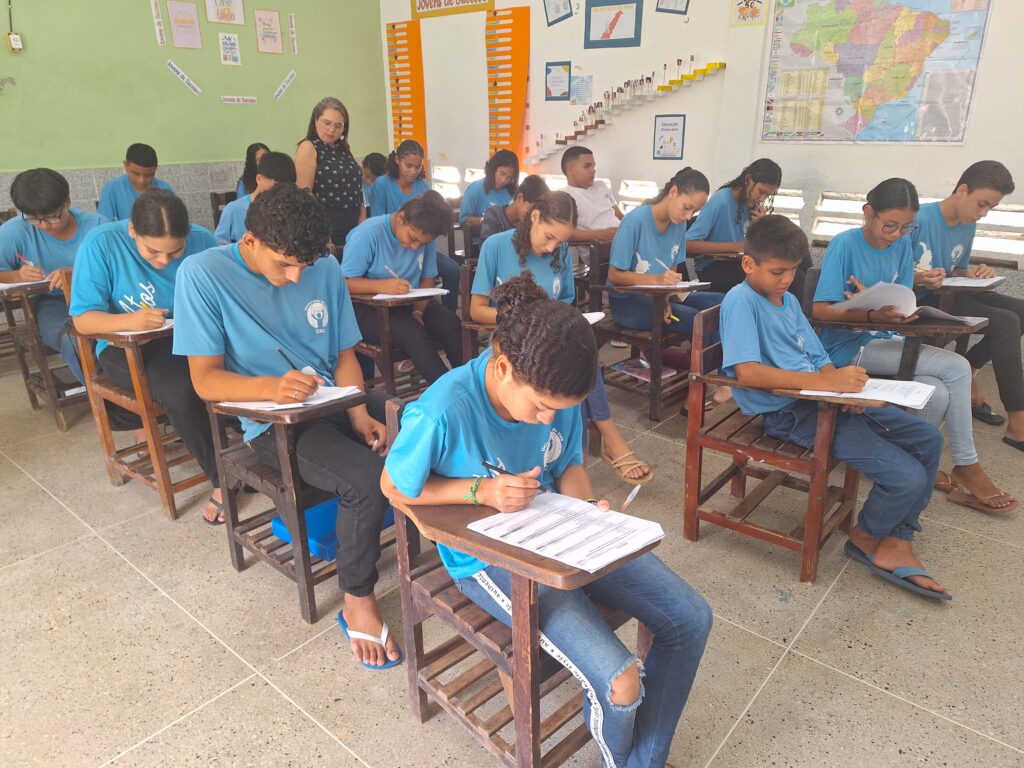 8th grade students studying in a classroom at the project.